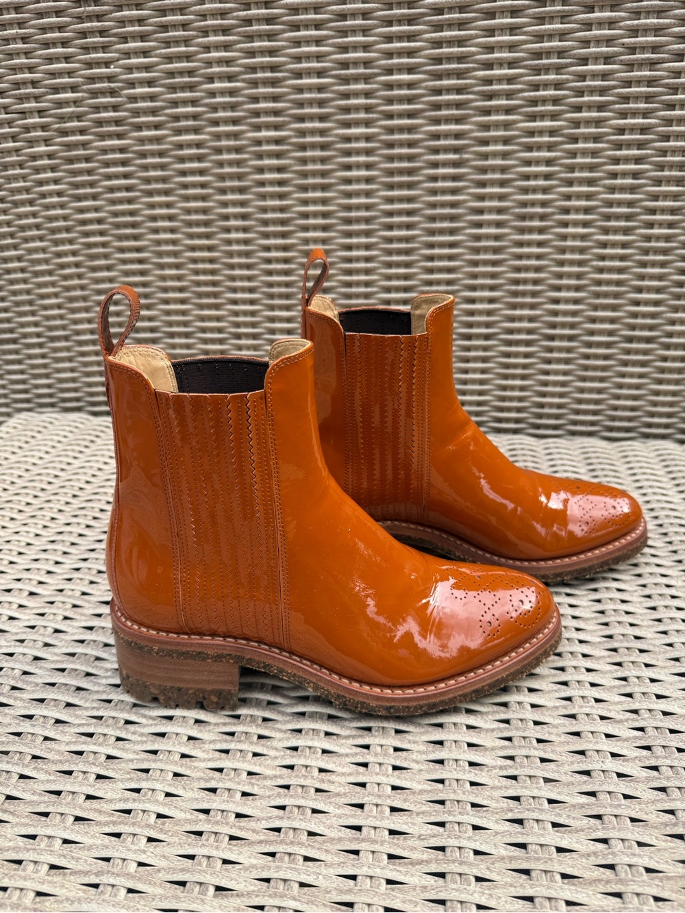The Office of Angela Scott Patent Orange Chelsea Ankle Booties